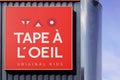 Tape ÃÂ  l`oeil logo and text sign storefront signage front of fashion clothing store